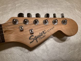 Fender Squier Electric Guitar With White Pickguard. 