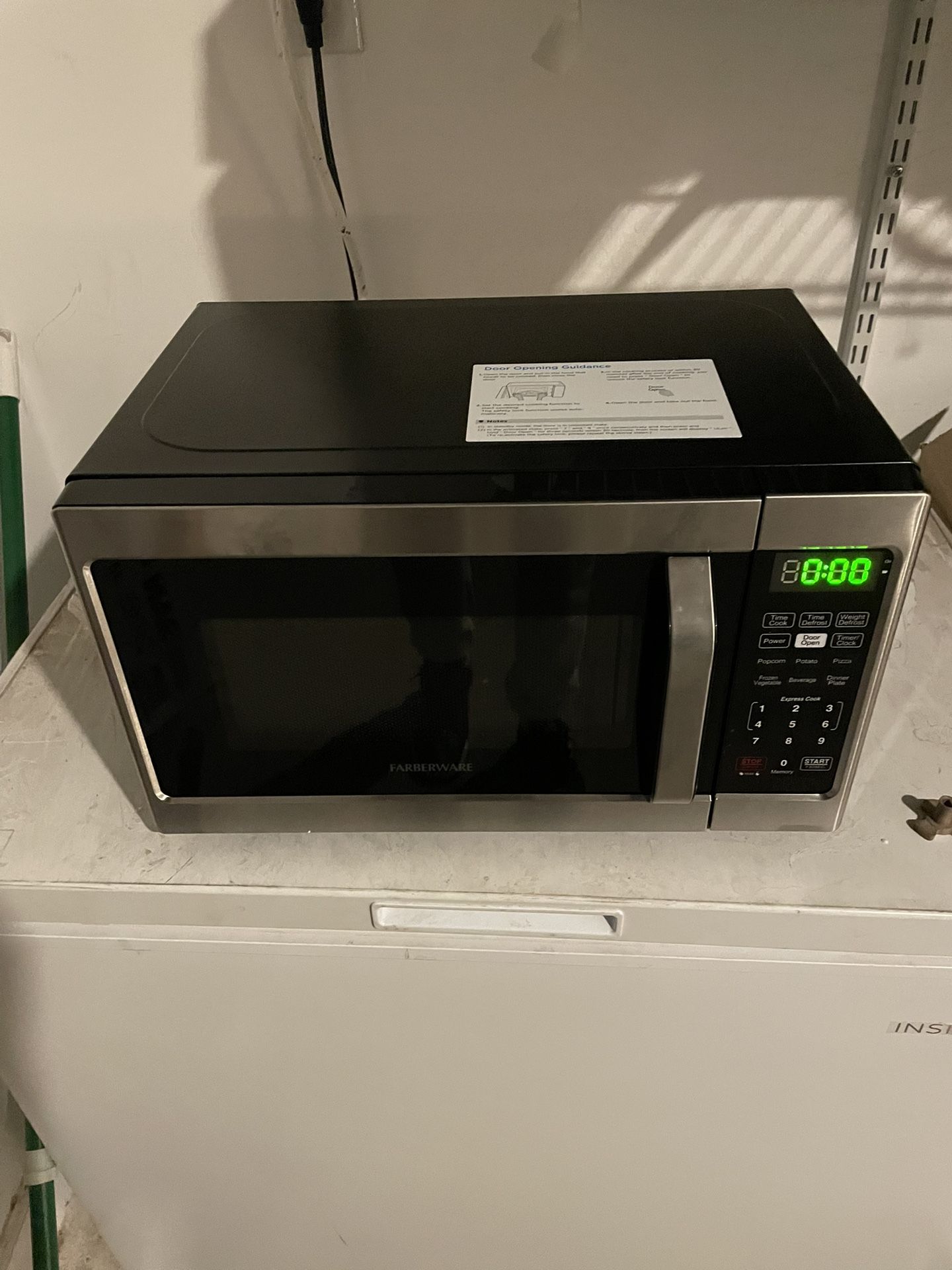 Farberware Classic 0.7 cu. Ft. Countertop Microwave in Brushed Stainless Steel 