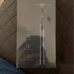 adult electric toothbrush new i have 2