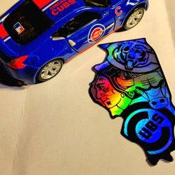 MLB, CHICAGO CUBS LOT: 2 items. Large, pull back, diecast car & Chicago Logo sticker, firm.