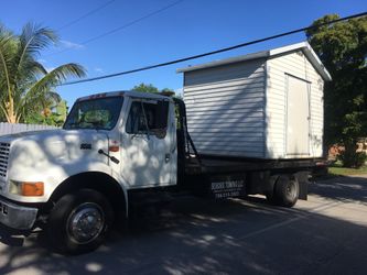 Sheds relocated..... movemo casita...