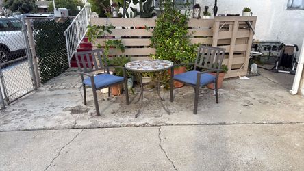 A style well patio table and chair chairs with two cushions