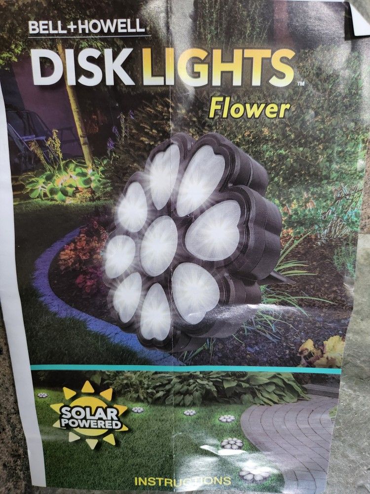 Brand New BELL & HOWELL flower Disk Light