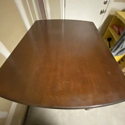 Black Coffee Table And Tall Brown Table