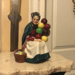 ROYAL DOULTON  FIGURINE  8 Inches Tall 7 inches Wide 