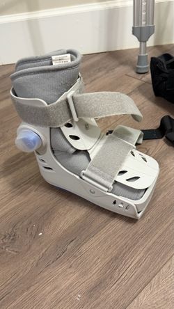 Crutches, air walker boot and ankle brace