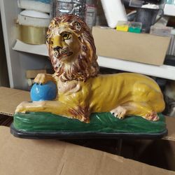 Vintage resting lion with ball ceramic figurine