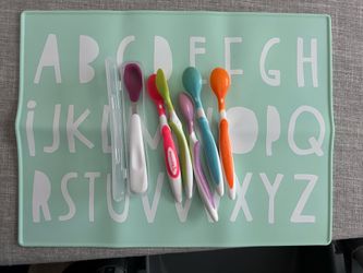Alphabet placemat, munchkin brand baby spoons, oxo brand baby spoon with case