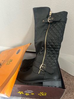 Brand new black boots