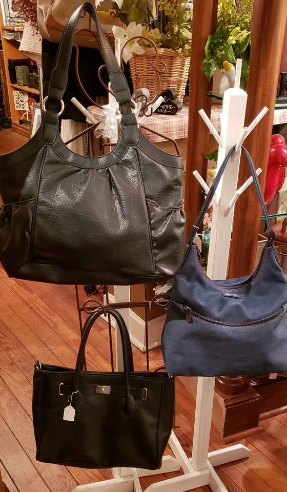 Pre-owned in nice condition, clean handbags with open centers.. Black tote 10x10x4 -11in drop Black sachel bag 12x12x3-9in drop Liz Claiborne 10x11