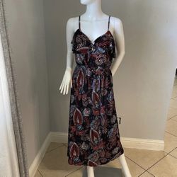 New Women’s Sleeveless Dress size  Medium is available  New with tags Stretchy waist It ties the front