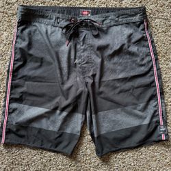 Vans Men's black and grey Nathan Florence swim surf board shorts in size 36