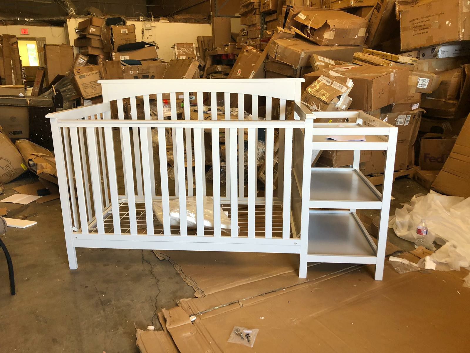 Crib with changing table minor damage but is assembled
