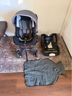 Doona car seat/stroller with base and car seat cover