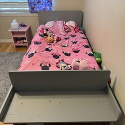 Grey twin sized bed