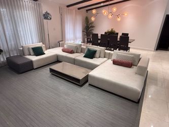 Italian sofa with stone coffee table