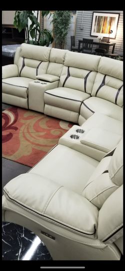 Off white leather gel power reclining sectional