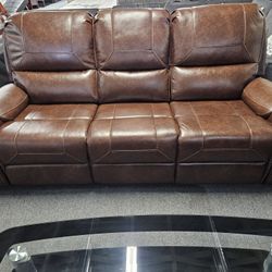 Brand New Brown Synthetic Leather Manual Reclining Rocking Loveseat With Center Console, USB, And Charging Ports (77 x 40 x 42 in. H)