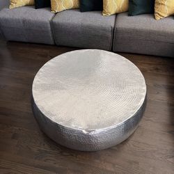 Coffee Table: - 42 in. Silver Medium Round Aluminum Drum Shaped Coffee Table with Hammered Design