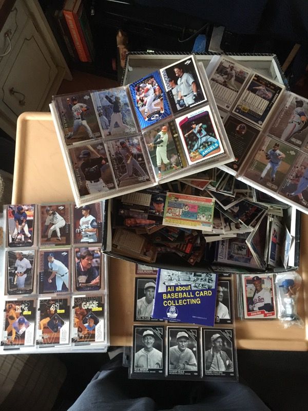 Shoebox full of baseball cards and baseball books