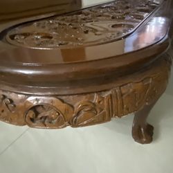1980’s Hand- Carved Chinese Oval Coffee Table with protector Glass Top.