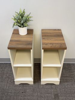 Set of 2, 25.6”H Farmhouse Side Tables / End Tables with open storage shelves. Off white finish with brown wood tops. Great for beside a sofa, as end