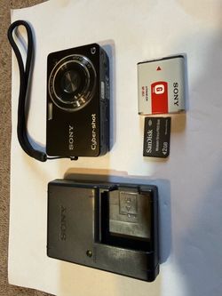 SONY Cyber Shot DSC-WX1 10.2MP 5x Zoom Digital Camera - Black. Camera is in an excellent condition. It comes with battery, sd card and charger.