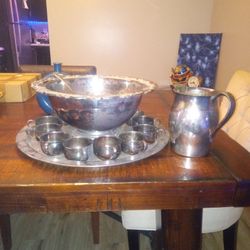 Oneida 12 Tea Cups,1 Punch Bowl ,1 Tray, 1 Serving Spoon,1 Tea Put