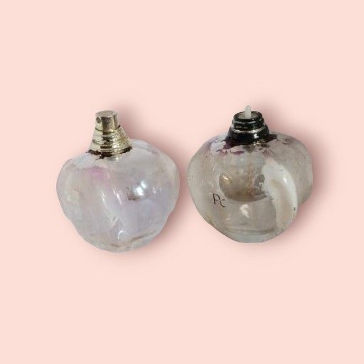 2 Bottles of Poison by Christian Dior Perfume 3.4 oz., writing and color is worn off, and sprayer is missing from one bottle,
60% full, and 50% full