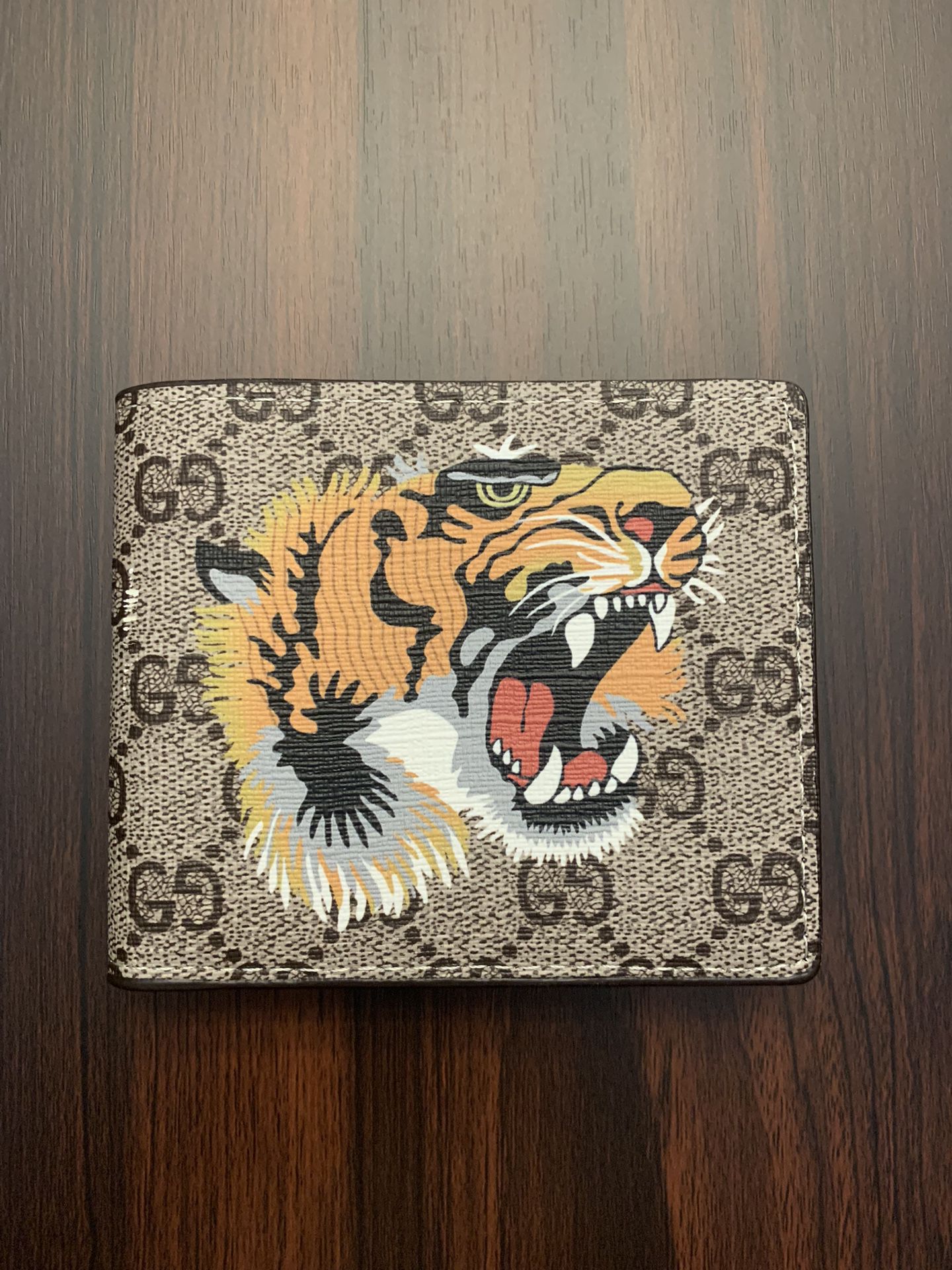 Gucci Bifold Wallet- GG Supreme Tiger Beige
