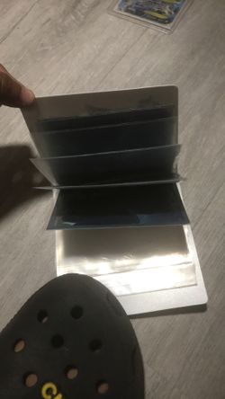 A pack of 6 card savers in an mini Pokémon binder