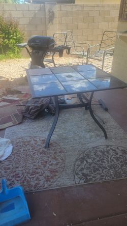 Patio Table And 3 Chairs.