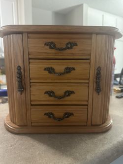Beautiful wooden jewelry box with a classic design.