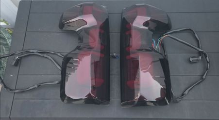 Recon tail light for Silverado 1500 Halogen models on smoked red