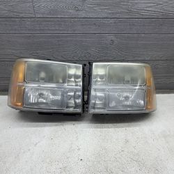 2007-2013 GMC Sierra Headlights - OEM
