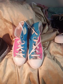 Woman's size 8 pink and blue converse shoes