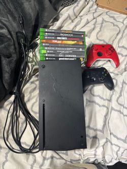 xbox Series x with controllers and games