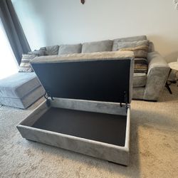Light Gray Sectional Couch w/ Storage Ottoman – Clean & Comfy!