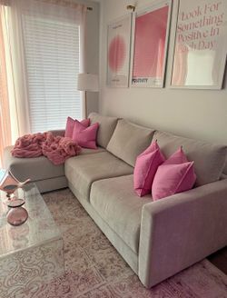 Light grey living spaces couch