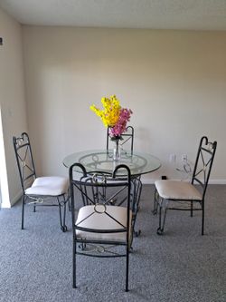 Black Round glass dining table with 4 chairs