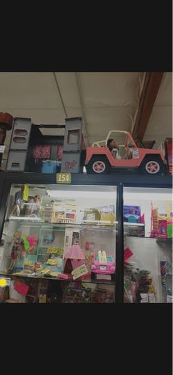 Pink Off-Roader Jeep with working electronics • Bluetooth capability • Matching trailer • 2 Our Generation dolls