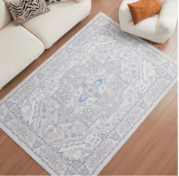 5x7 light gray patterned area rug