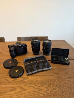 A7RV with Tamron Lens and accessories.