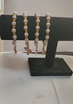 White Cross Bead Stretch Bracelets with Gold Charms