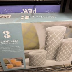 Flameless LED Wax Candles, Set of 3 flameless LED wax candles with 5-hour timer and 500 hours battery run time.