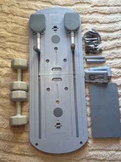 Purple Gaiam Pilates board and other items