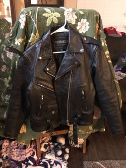 Woman's black leather motorcycle jacket
