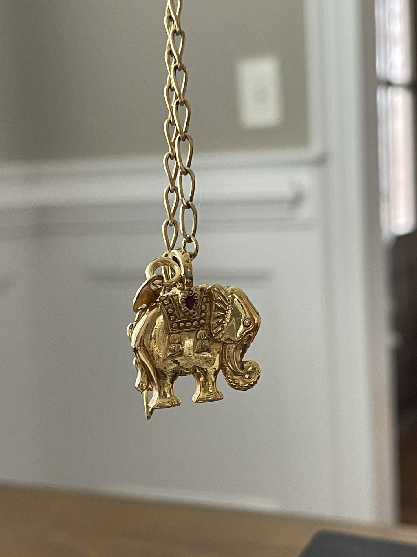 Avon elephant necklace store