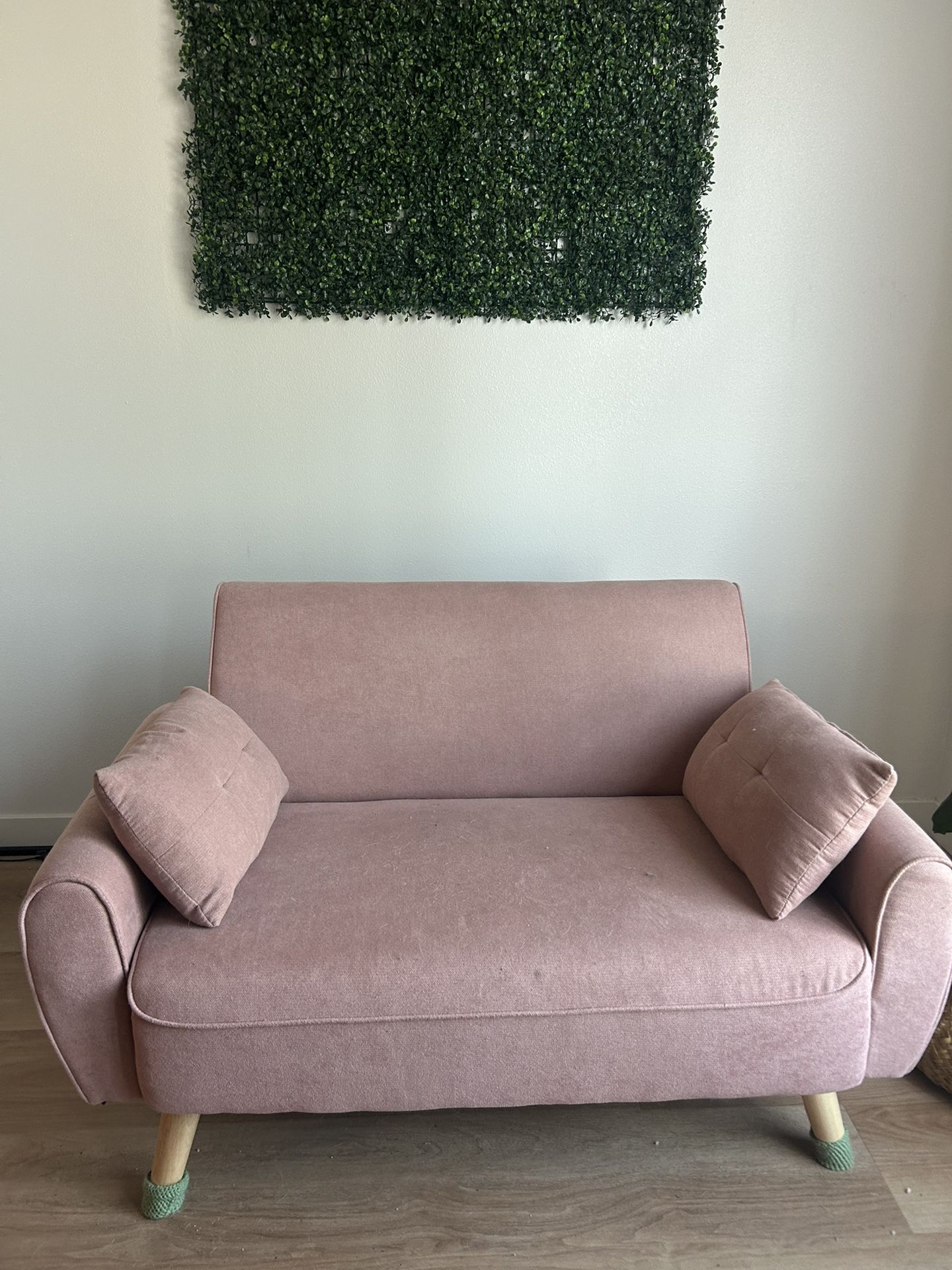 small pink love seat