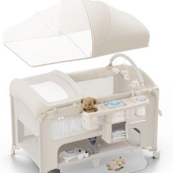 NEW - 4 in 1 Baby Bassinet, Pack and Play, Bedside Crib Sleeper, Diaper Changer - Comes with Mattress, Mosquito Net，Bottom Storage and Toy Bar for New